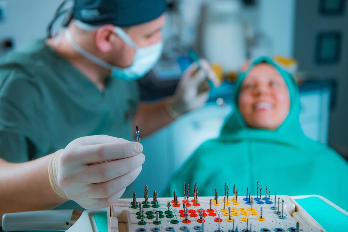 Dentist with prosthetist box set of tools for the installation dental implants